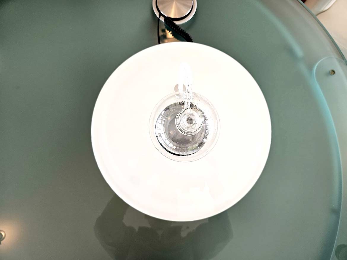 The top view shows the circular shape